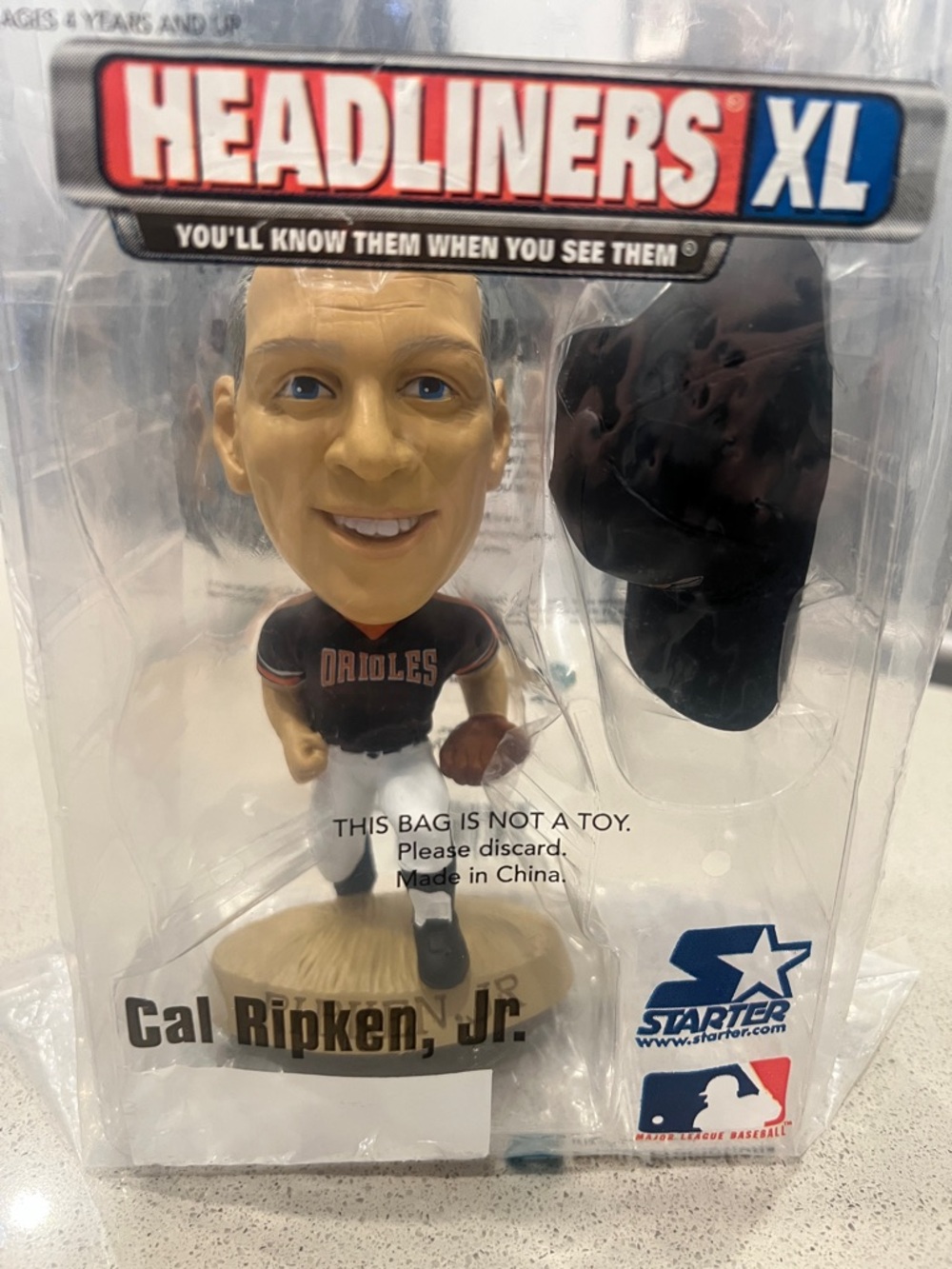 STARTER Cal Ripken Jr. Orioles Bobblehead with Black Cap and Cream Base